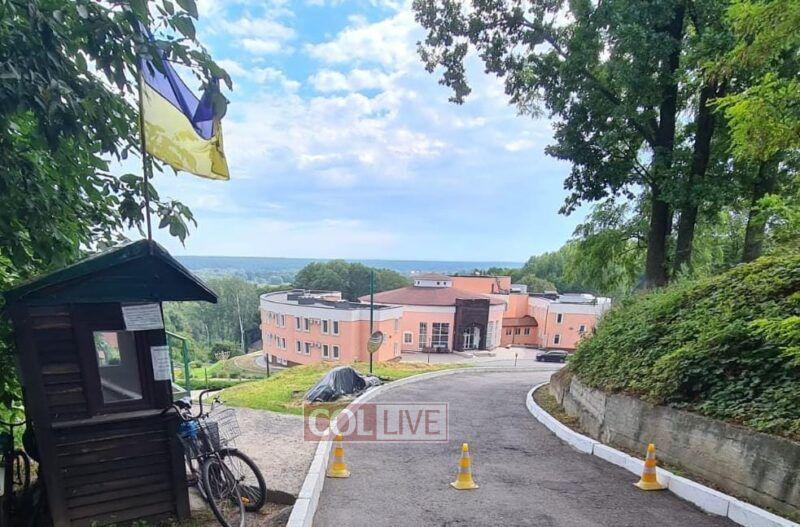 The shrine of the Alter Rebbe with billowing smoke in the background from tank battles between the Russians and the Ukrainians