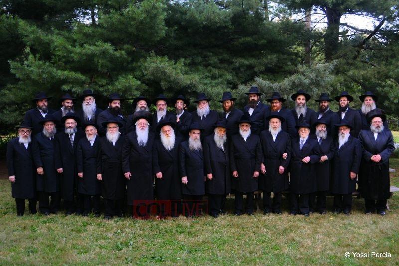 Rabbi Brisman (first row, third from left) stands with participants of the Global Yarchei Kallah in 2010 at Camp Gan Israel in Parksville, New York