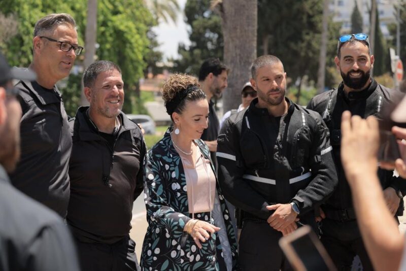 Minister Silman with supporters