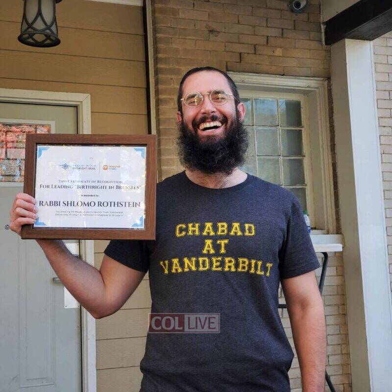 Rabbi Shlomo Rothstein from Chabad at Vanderbilt with his award certificate