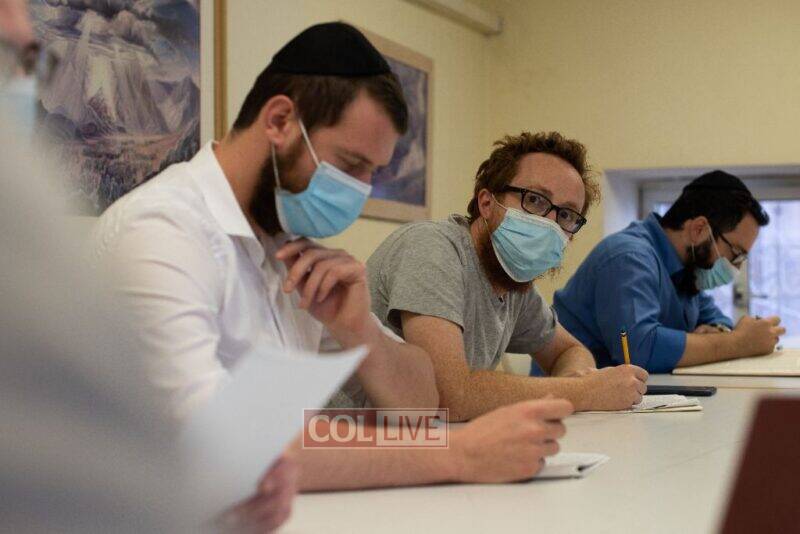 Students attend a class at the Mayanot Men_s Program during Covid