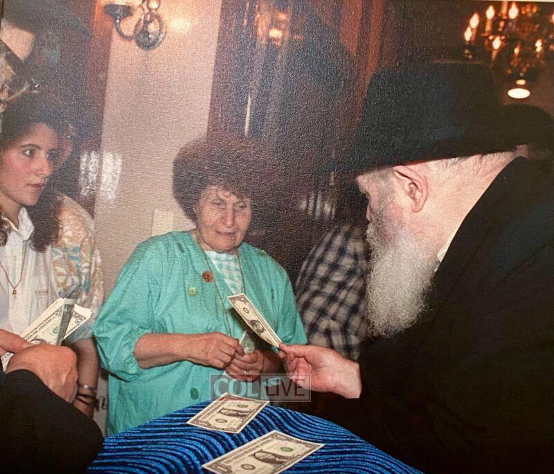 Receiving a Bracha  and dollar from the Rebbe before camp sessions begin - beginning of summer - 26 Sivan 1989<br />

