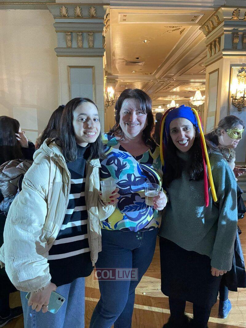 Margalit Chudaitov meeting a recent Ukrainian refugee at the Bais Shmuel Chabad Purim bash in Crown Heights