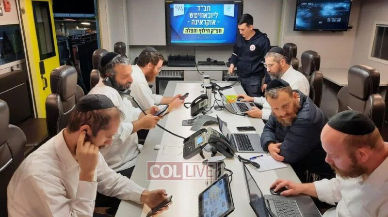 Rabbi Shlomo Peles (center left) at the command center of the Jewish Relief Network Ukraine (JRNU)