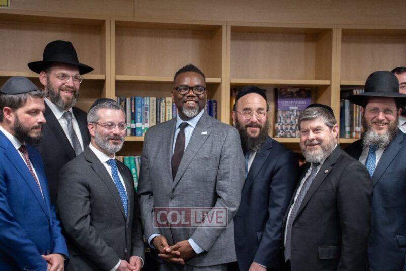 L-R: Mr. Michie Nudell, Rabbi Yaakov Robinson, Rabbi Shlomo Soroka, Mayor-elect Brandon Johnson, Rabbi Nosson Muller, Mr. Moshe Davis, Rabbi Tzvi Bider