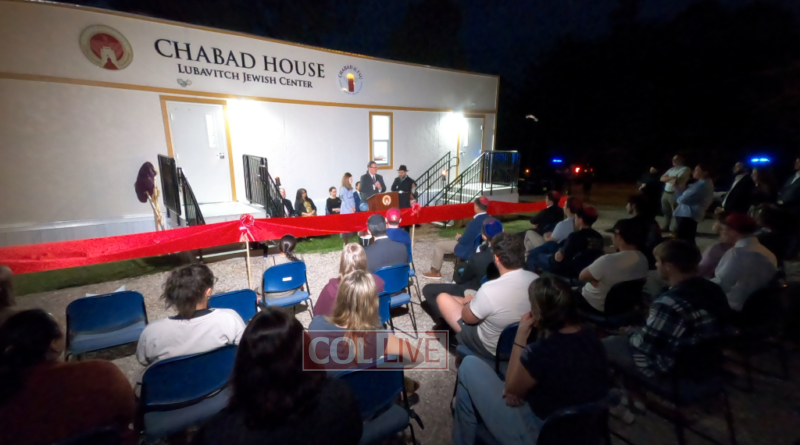 Mayor John Dailey speaking, Chanie Oirechman to the left and Rabbi Schneur to the right. Sitting are FSU President McCollough and First Lady of FSU Jai Vartikar, and FSU Vice President Dr. Amy Hecht