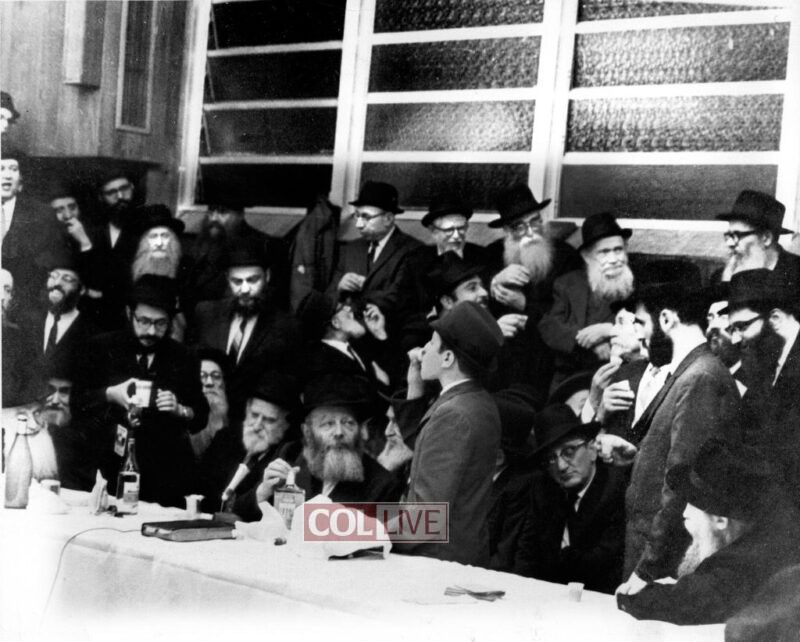 The Rebbe pours lchaim to S.L. Abramowitz at Yud Tes Kislev 5726/1965 farbrengen in honor of Bar Mitzvah