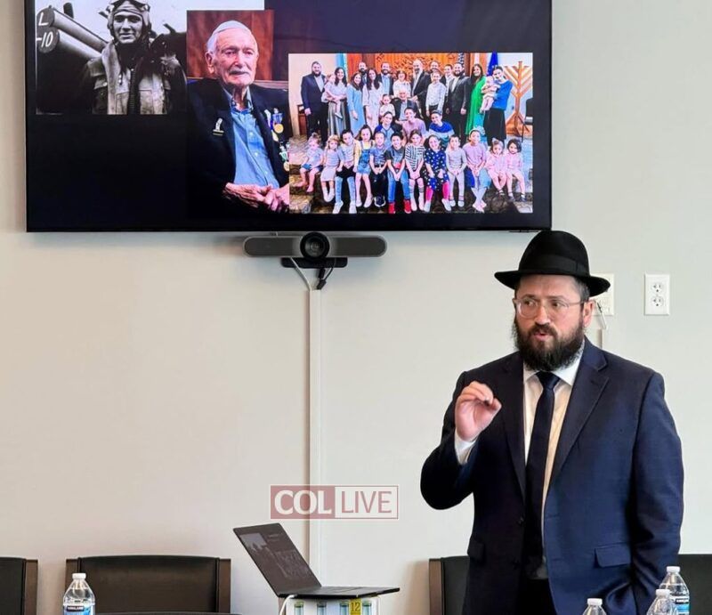Rabbi Mendel Teldon presents in the Cannon Building of Capitol Hill
