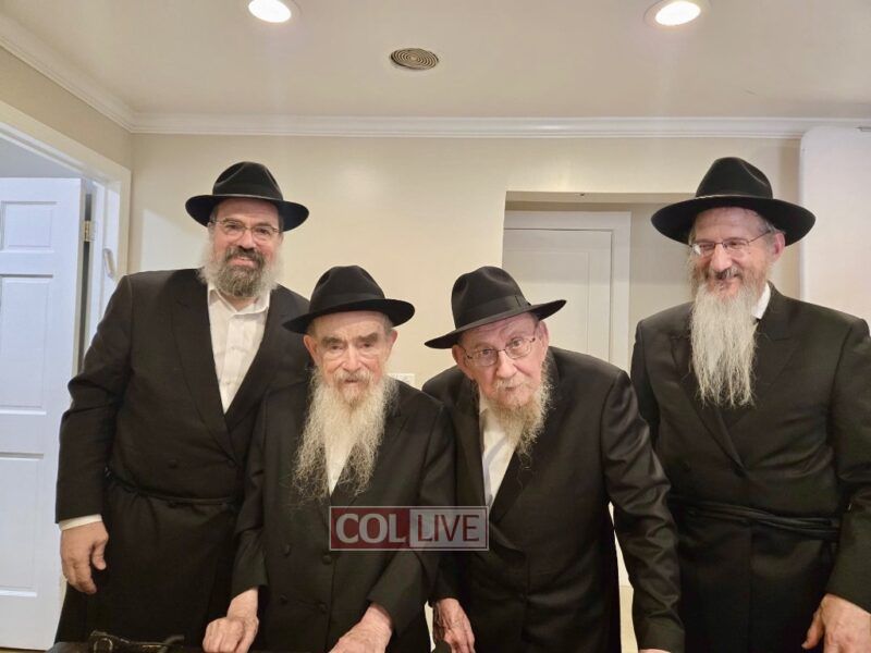 Rabbi Avraham Shemtov and Rabbi Moshe Lazar joined by their sons Rabbi Levi Shemtov and Rabbi Berel Lazar